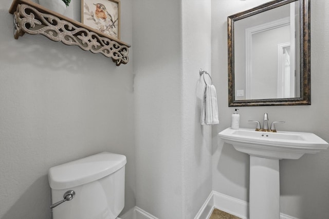 3500 Oak Island Ln, Flower Mound, TX 75028 - bathroom with toilet and baseboards