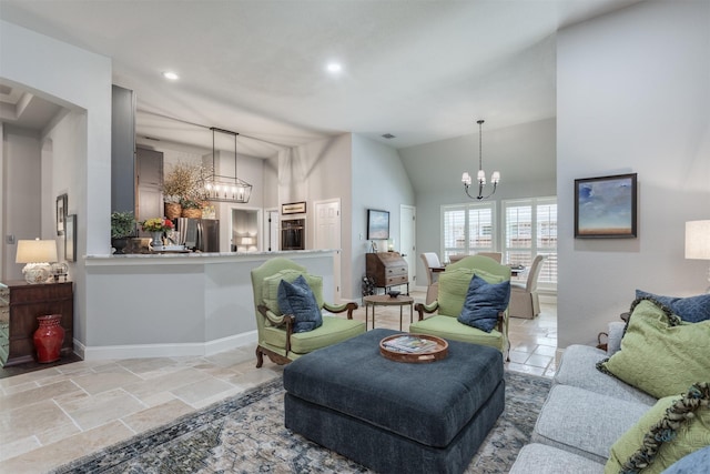 507 Clover Leaf Ln, Mckinney, TX 75072 - living room featuring a chandelier, stone tile floors, lofted ceiling, recessed lighting, and baseboards
