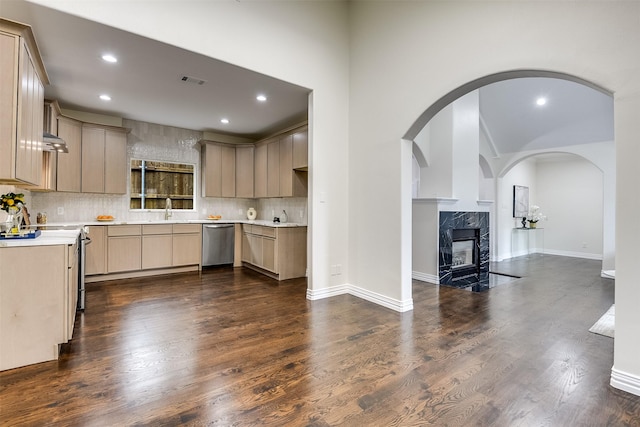 4605 Lafayette Ave, Fort Worth, TX 76107 - kitchen featuring stainless steel dishwasher, tasteful backsplash, recessed lighting, light countertops, and dark wood finished floors