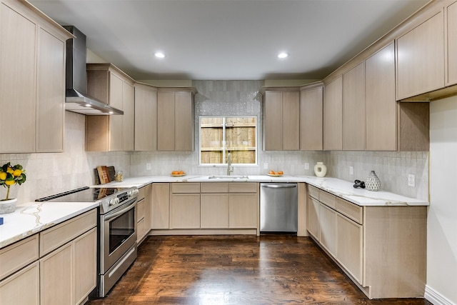 4605 Lafayette Ave, Fort Worth, TX 76107 - kitchen with stainless steel appliances, wall chimney range hood, a sink, light stone counters, and tasteful backsplash