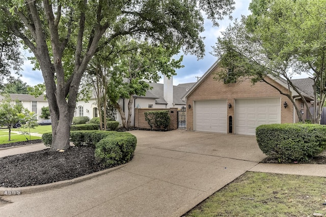 4605 Lafayette Ave, Fort Worth, TX 76107 - view of front of home with brick siding and driveway