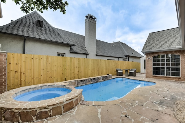 4605 Lafayette Ave, Fort Worth, TX 76107 - view of swimming pool with a patio area, a fenced backyard, and a pool with connected hot tub