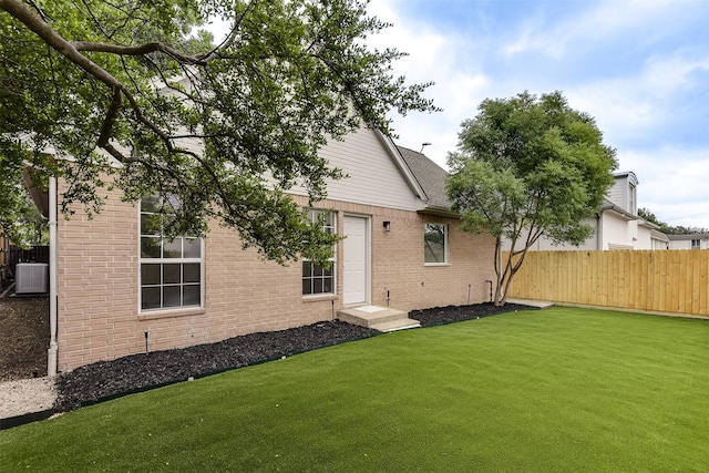 4605 Lafayette Ave, Fort Worth, TX 76107 - rear view of house featuring central AC unit and brick siding