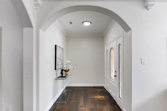 4605 Lafayette Ave, Fort Worth, TX 76107 - entrance foyer with crown molding, dark wood-style flooring, baseboards, and arched walkways