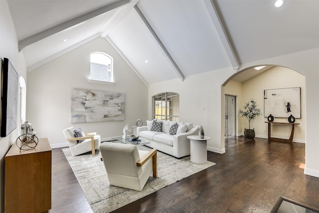 4605 Lafayette Ave, Fort Worth, TX 76107 - living room with arched walkways, beamed ceiling, plenty of natural light, wood finished floors, and high vaulted ceiling