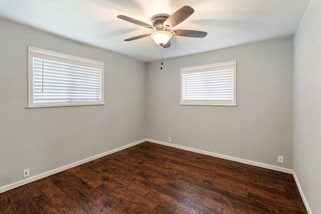 120 Rosedale Dr, Athens, TX 75751 - unfurnished room featuring a ceiling fan, baseboards, and dark wood-style floors