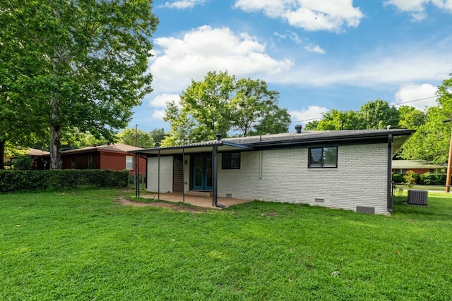 120 Rosedale Dr, Athens, TX 75751 - rear view of property featuring crawl space, a patio area, brick siding, a yard, and central AC unit
