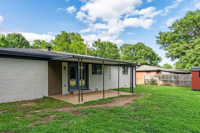 120 Rosedale Dr, Athens, TX 75751 - rear view of property featuring brick siding and a patio area