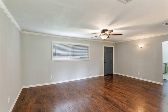 120 Rosedale Dr, Athens, TX 75751 - empty room featuring a ceiling fan, dark wood-type flooring, ornamental molding, and baseboards