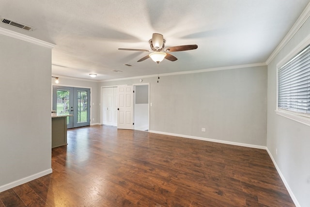 120 Rosedale Dr, Athens, TX 75751 - spare room with ceiling fan, crown molding, dark wood-style floors, and baseboards