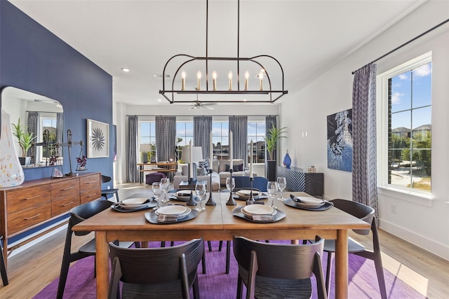 8120 Bromley Dr, Dallas, TX 75231 - dining room featuring light wood-type flooring, recessed lighting, a chandelier, baseboards, and ceiling fan