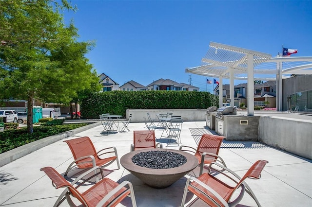 8120 Bromley Dr, Dallas, TX 75231 - view of patio with a fire pit, a pergola, a residential view, and a grill