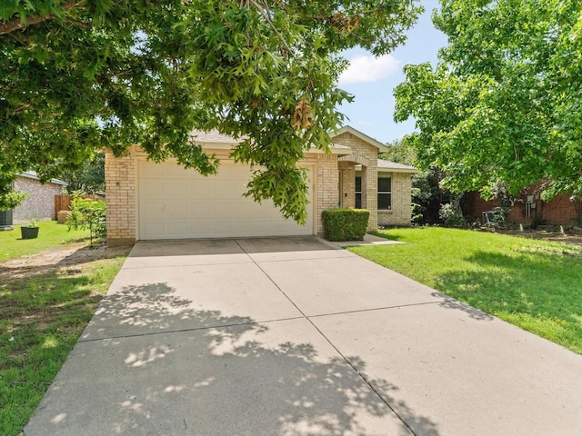 7605 Mosspoint Ct, Denton, TX 76210 - view of front facade with brick siding, concrete driveway, a front lawn, and an attached garage