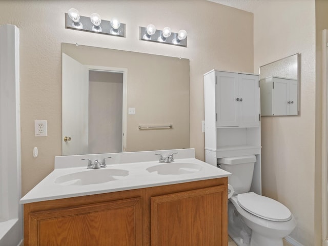 7605 Mosspoint Ct, Denton, TX 76210 - full bathroom with double vanity and toilet