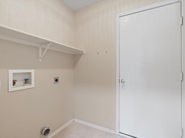7605 Mosspoint Ct, Denton, TX 76210 - laundry room featuring hookup for an electric dryer, hookup for a washing machine, baseboards, and light tile patterned floors