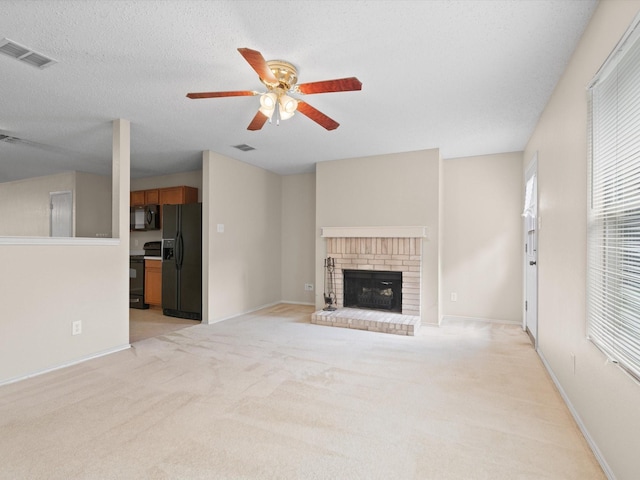 7605 Mosspoint Ct, Denton, TX 76210 - unfurnished living room featuring ceiling fan, light colored carpet, a fireplace, and baseboards