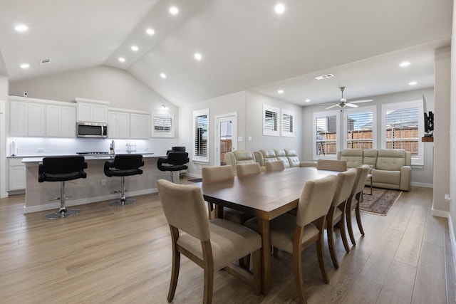 2012 Edgewater St, Celina, TX 75009 - dining room with light wood-style flooring, ceiling fan, vaulted ceiling, recessed lighting, and baseboards