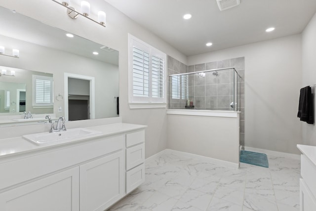 2012 Edgewater St, Celina, TX 75009 - bathroom featuring vanity, a shower stall, recessed lighting, marble finish flooring, and baseboards