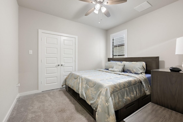 2012 Edgewater St, Celina, TX 75009 - carpeted bedroom featuring baseboards, a closet, and a ceiling fan