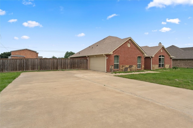 238 Rudder, Gun Barrel City, TX 75156 - view of front of house featuring brick siding, a chimney, roof with shingles, a garage, and driveway