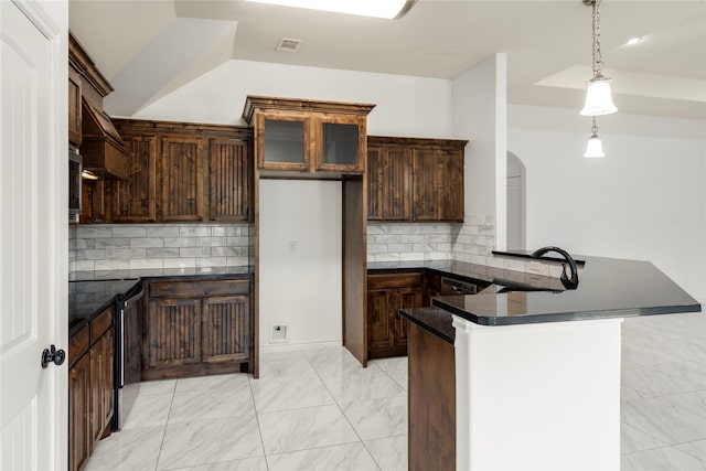 238 Rudder, Gun Barrel City, TX 75156 - kitchen with dark countertops, a peninsula, a sink, decorative backsplash, and decorative light fixtures