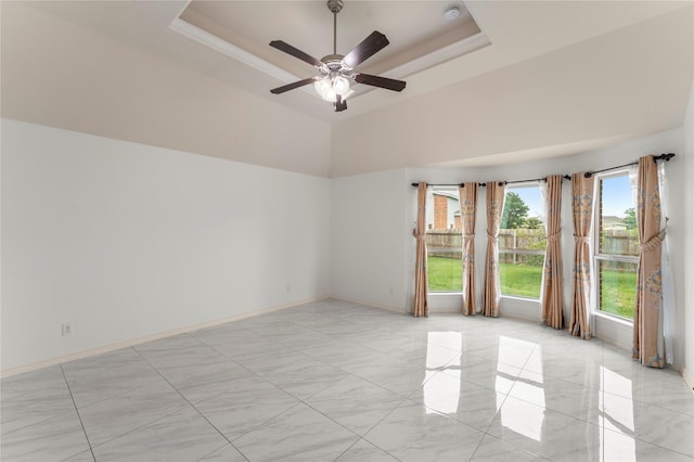 238 Rudder, Gun Barrel City, TX 75156 - unfurnished room with ceiling fan, a raised ceiling, a smoke detector, and baseboards