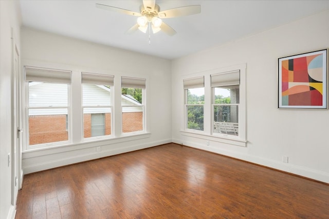 4016 Pershing Ave, Fort Worth, TX 76107 - spare room featuring baseboards, dark wood-style floors, and ceiling fan