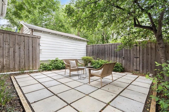 4016 Pershing Ave, Fort Worth, TX 76107 - fenced backyard with a patio area