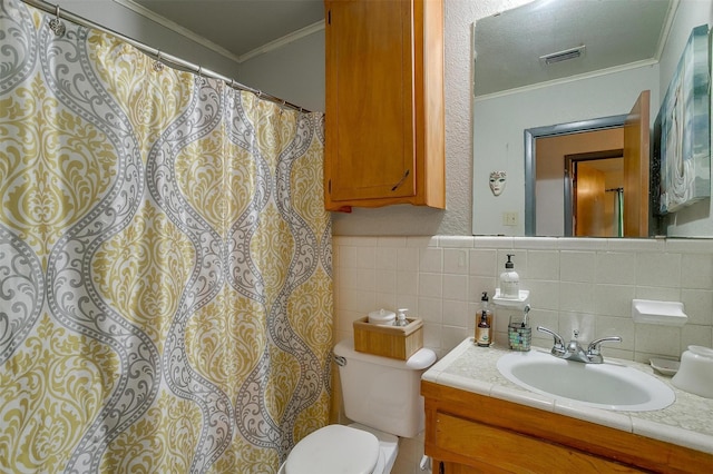 905 E Renfro St, Burleson, TX 76028 - bathroom with toilet, vanity, crown molding, tile walls, and curtained shower