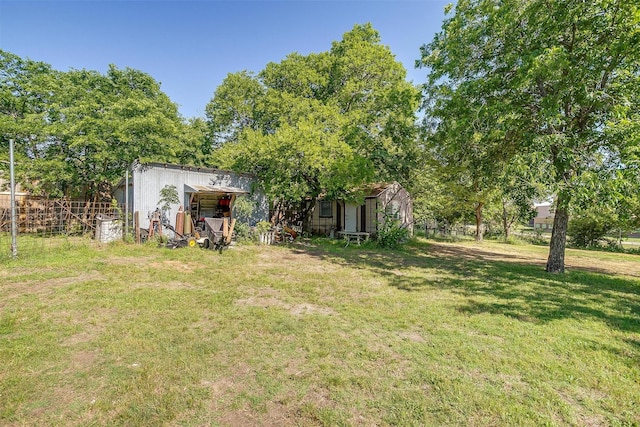 905 E Renfro St, Burleson, TX 76028 - view of yard with an outdoor structure and an outbuilding