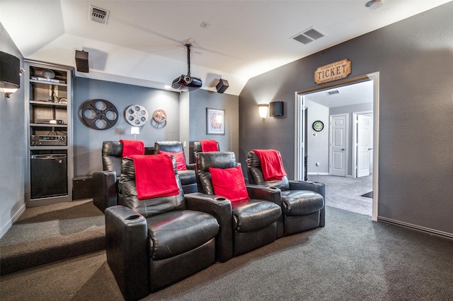 7201 Faraday Ln, Mckinney, TX 75071 - carpeted home theater room with lofted ceiling and baseboards