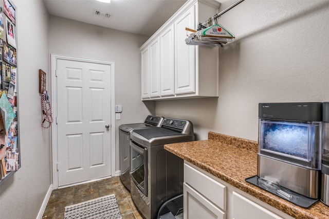 7201 Faraday Ln, Mckinney, TX 75071 - laundry room featuring separate washer and dryer, baseboards, cabinet space, and dark stone finish flooring