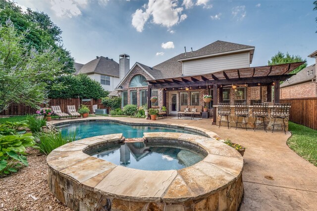 7201 Faraday Ln, Mckinney, TX 75071 - view of pool with a pergola, a patio, a pool with connected hot tub, and an outdoor hangout area