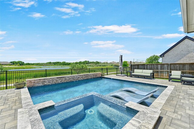 782 Corner Post Path, Celina, TX 75009 - view of swimming pool with a water view, a patio area, a fenced backyard, and a pool with connected hot tub