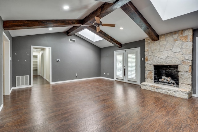10118 Cromwell Dr, Dallas, TX 75229 - unfurnished living room with a skylight, a ceiling fan, wood finished floors, and baseboards