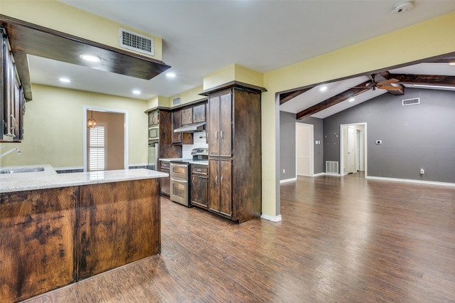 10118 Cromwell Dr, Dallas, TX 75229 - kitchen featuring range with two ovens, ceiling fan, dark brown cabinetry, dark wood-style flooring, and a sink