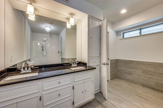10118 Cromwell Dr, Dallas, TX 75229 - full bathroom with double vanity and a stall shower