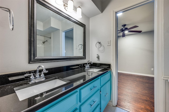 10118 Cromwell Dr, Dallas, TX 75229 - full bathroom featuring double vanity, ceiling fan, and a shower