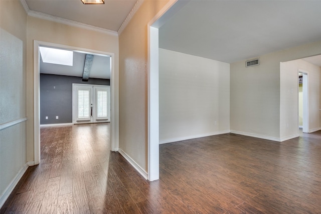 10118 Cromwell Dr, Dallas, TX 75229 - hallway featuring dark wood-style floors, crown molding, a skylight, baseboards, and french doors