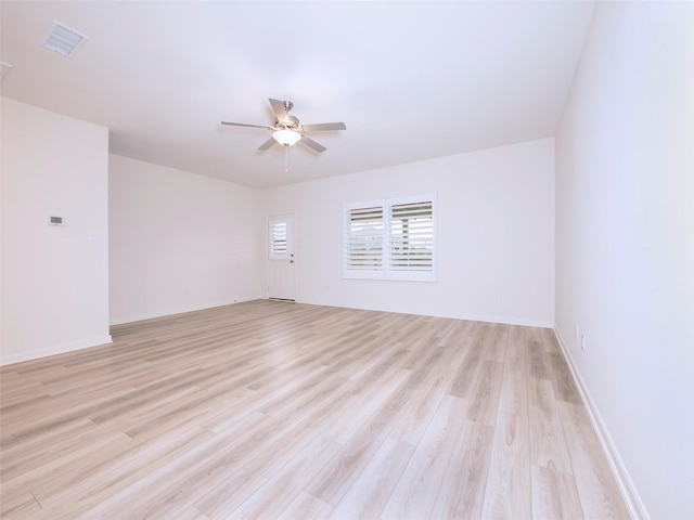 1218 Parker Dr, Princeton, TX 75407 - empty room with a ceiling fan and light wood-style floors
