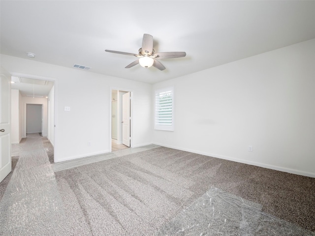 1218 Parker Dr, Princeton, TX 75407 - spare room with attic access, carpet, ceiling fan, and a smoke detector