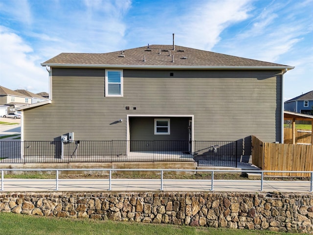 1218 Parker Dr, Princeton, TX 75407 - rear view of house featuring a shingled roof
