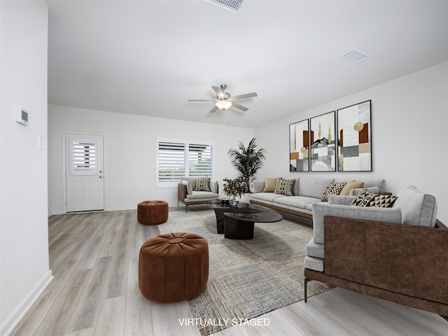 1218 Parker Dr, Princeton, TX 75407 - living area with light wood finished floors and a ceiling fan