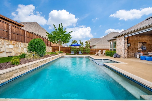 2021 Longmont Ln, Prosper, TX 75078 - view of pool featuring a patio area, a fenced backyard, and a pool with connected hot tub