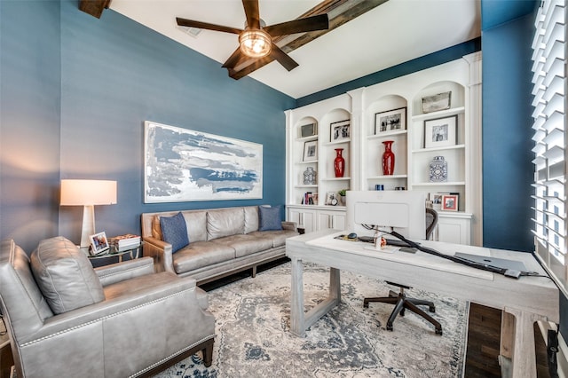2021 Longmont Ln, Prosper, TX 75078 - office featuring ceiling fan, wood finished floors, built in shelves, and beamed ceiling