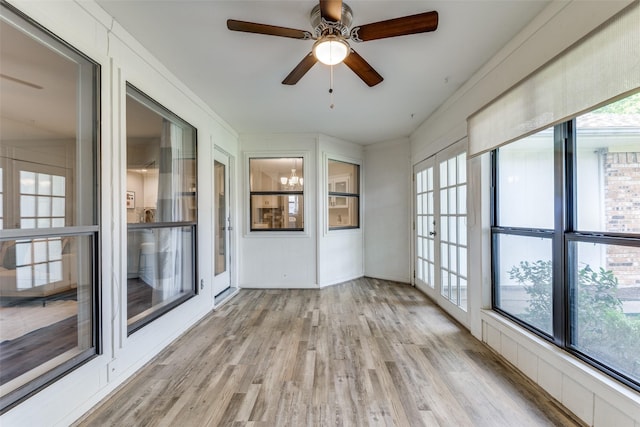 5004 Andover Dr, Plano, TX 75023 - unfurnished sunroom with french doors, wood finished floors, and plenty of natural light
