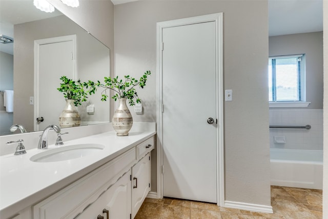 5004 Andover Dr, Plano, TX 75023 - bathroom with vanity and a tub