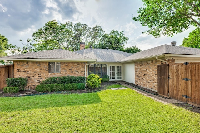 5004 Andover Dr, Plano, TX 75023 - rear view of house with french doors, brick siding, a chimney, a gate, and a shingled roof