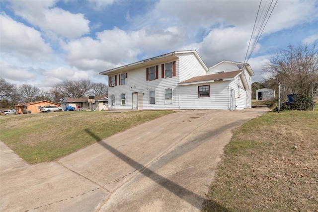7326 N La Flor Ln, Dallas, TX 75241 - view of front of home featuring driveway and a front lawn