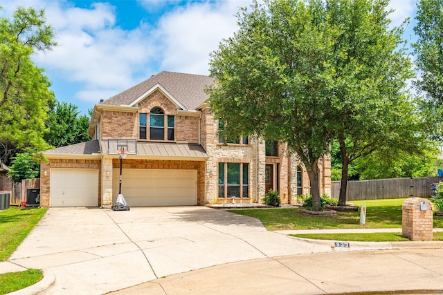933 Oatlands Pl, Burleson, TX 76028 - view of front facade featuring brick siding, roof with shingles, concrete driveway, and central AC unit